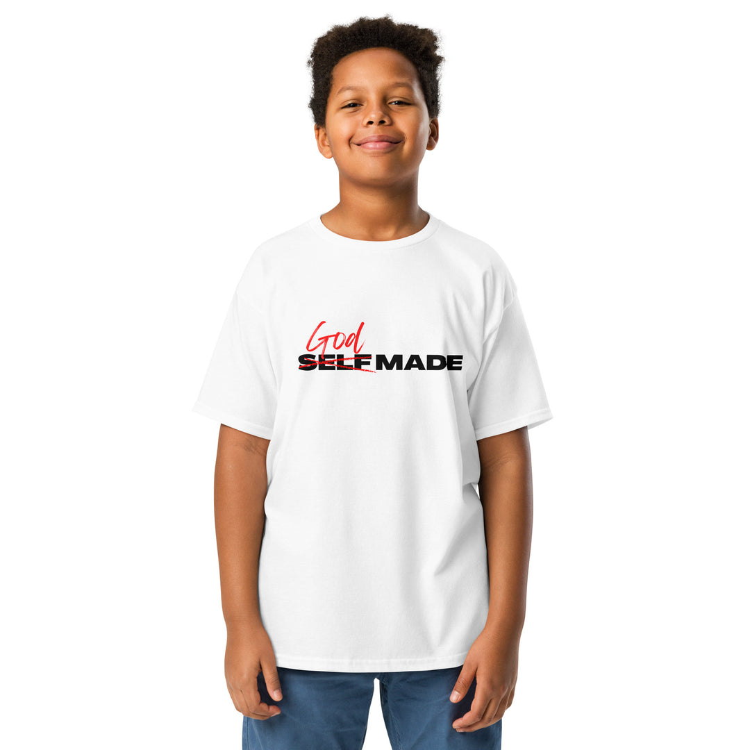 Child wearing a white t-shirt with 'God Self Made' text on a white background