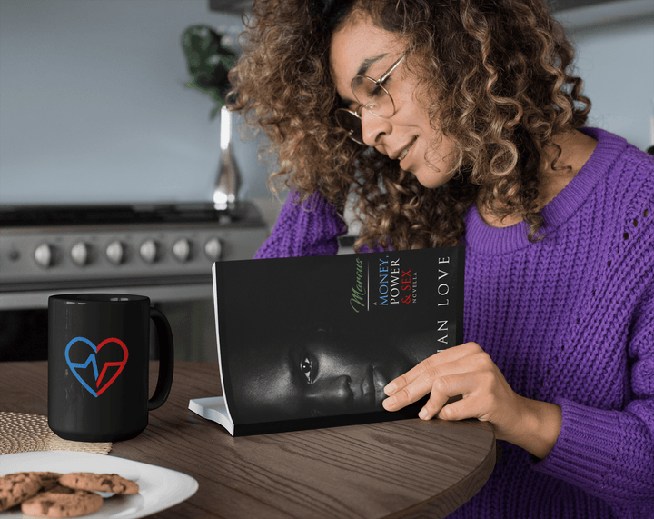 Woman Reading Marcus: A Money, Power & Sex Novella by Norian Love in a purple sweater.  Net to the Love Can Coffee Mug and a plate of cookies