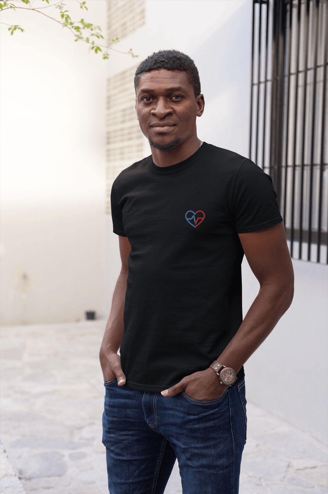 Black man, outside  wearing Black Love Clan Classic Embroidered T-Shirt - Norian Love