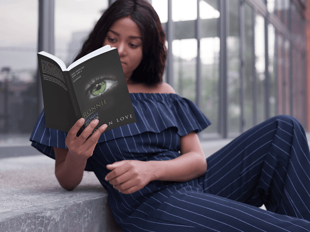 woman in striped blue outfit reading Ronnie: A Money, Power & Sex Story - by Norian Love