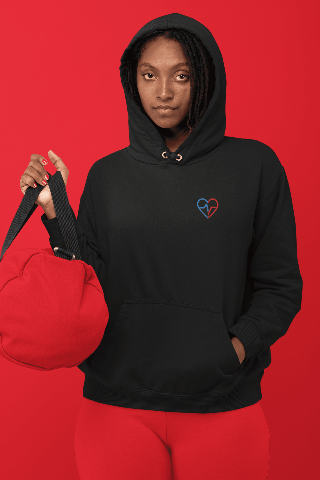 Woman holding red Gym Bag wearing Love Clan Classic Embroidered Hoodie by Norian Love