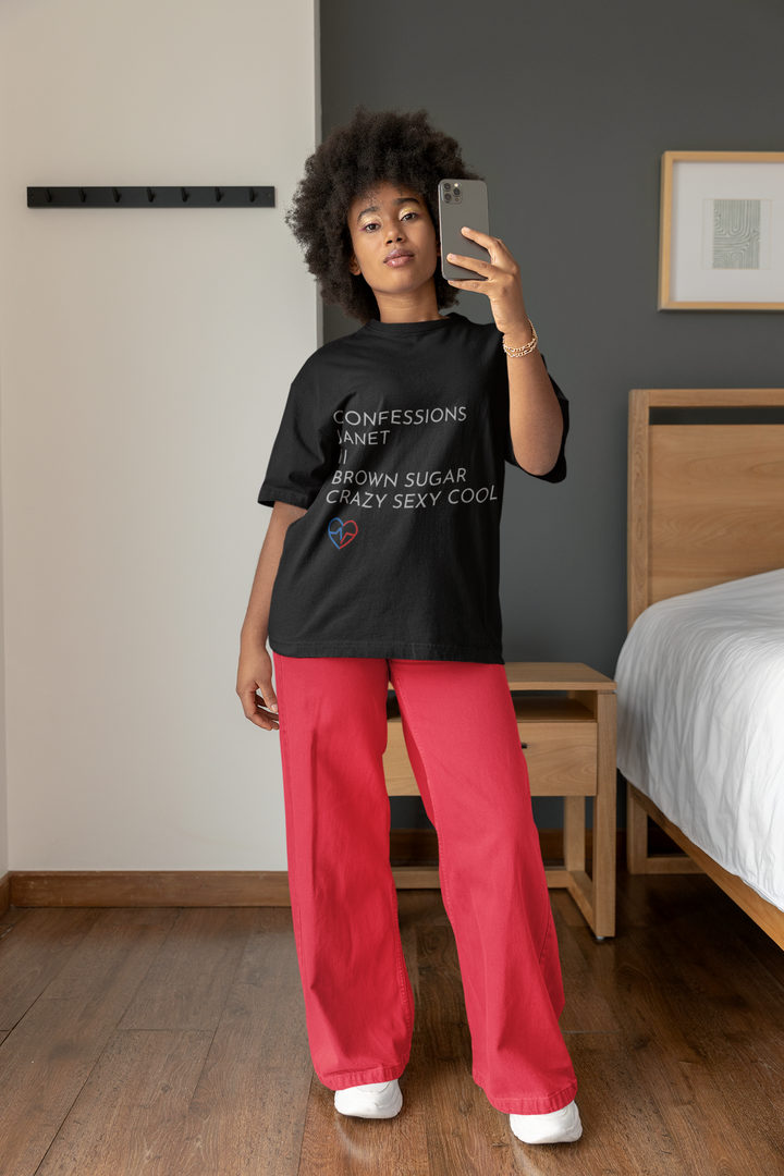 woman at home, taking a selfie wihile wearing the R&B Essentials Tee – Love Clan Classics by Norian Love