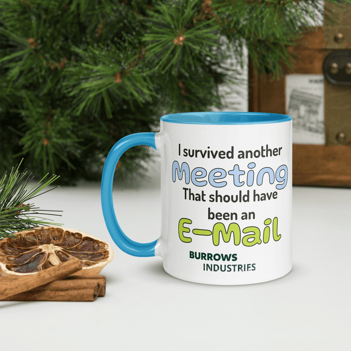 White ceramic mug with a light blue handle and interior featuring the Burrows Industries meeting-themed design.
