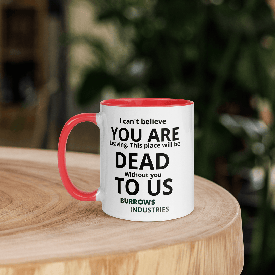 White ceramic mug with red handle and interior displaying the Burrows Industries farewell message.