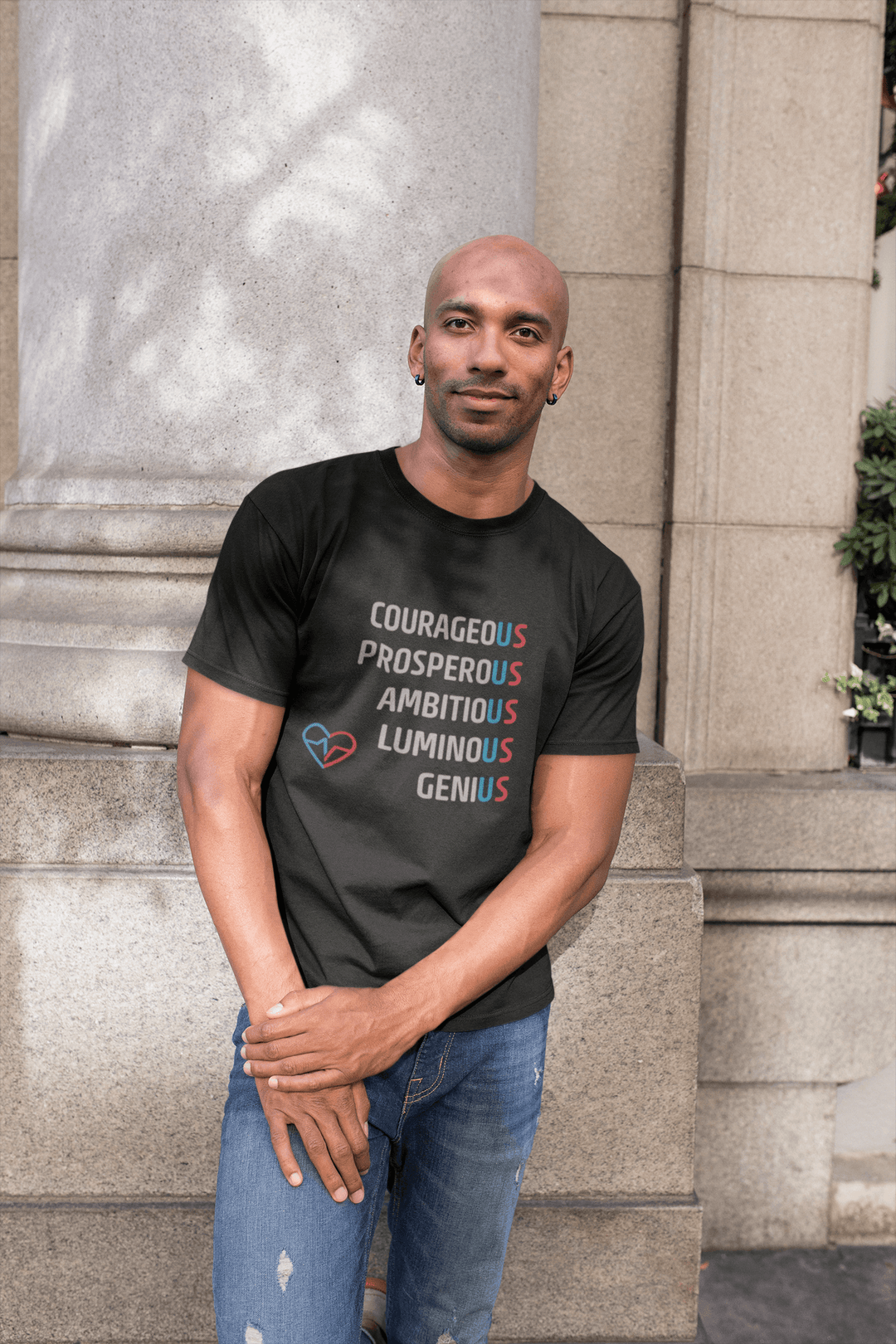 Man wearing The US Tee standing by stone column street style photo
